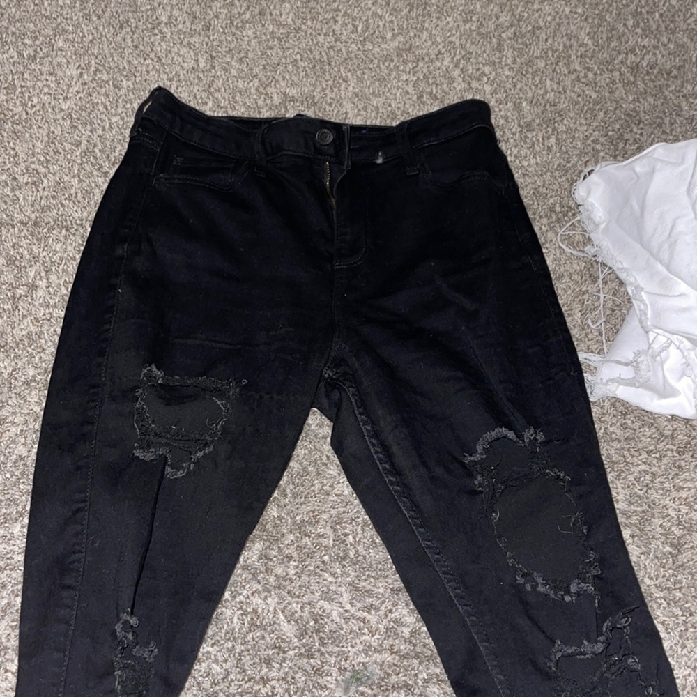 Black ripped jeans, American eagle